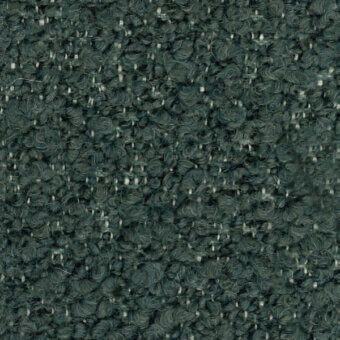 Dark green looped pile fabric sample with heathered cream fibers, tight irregular weave, textured nubby surface; labeled “turri > fabric cat. t > 765 g”.